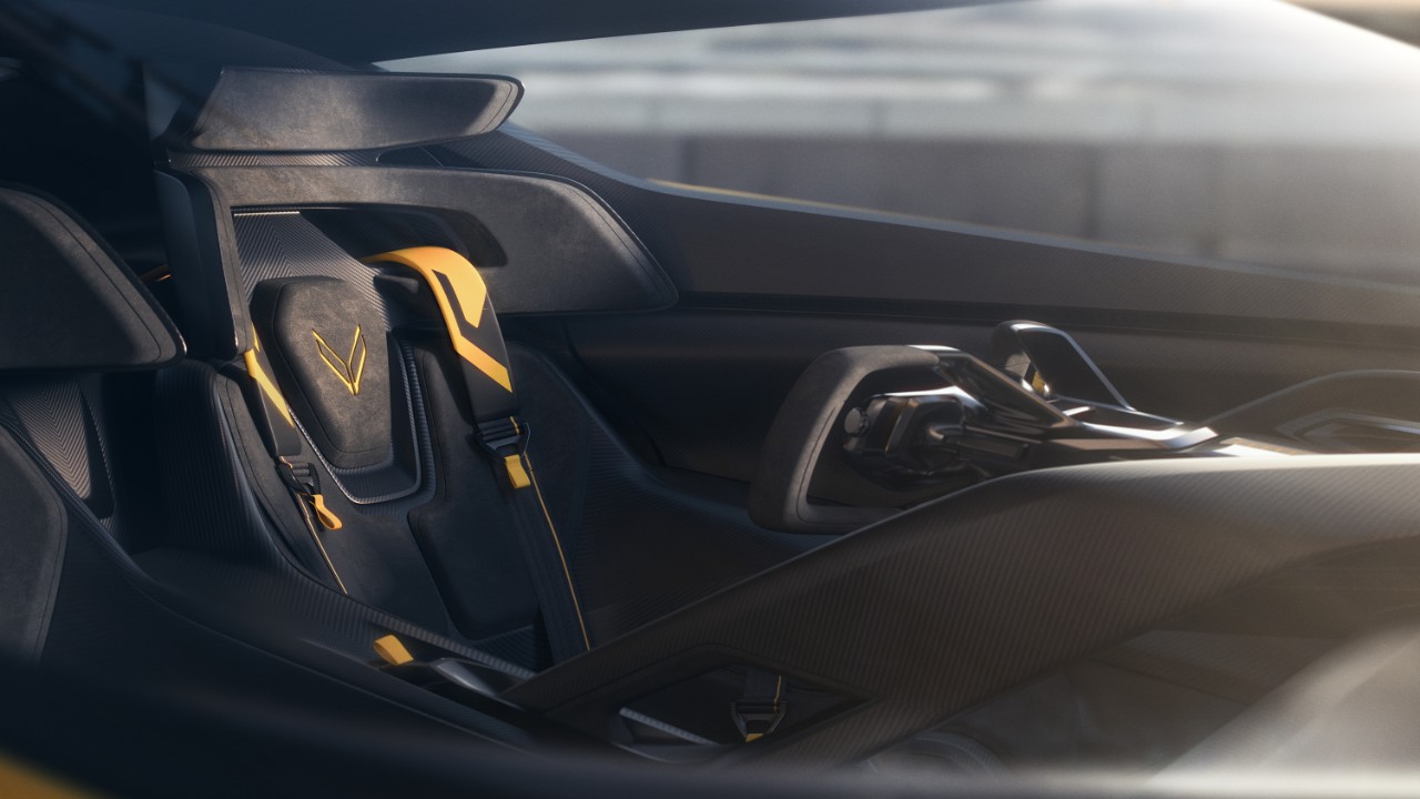 Corvette CX.R Vision Gran Turismo Concept The interior and bucket seats of a silver convertible sports car.
