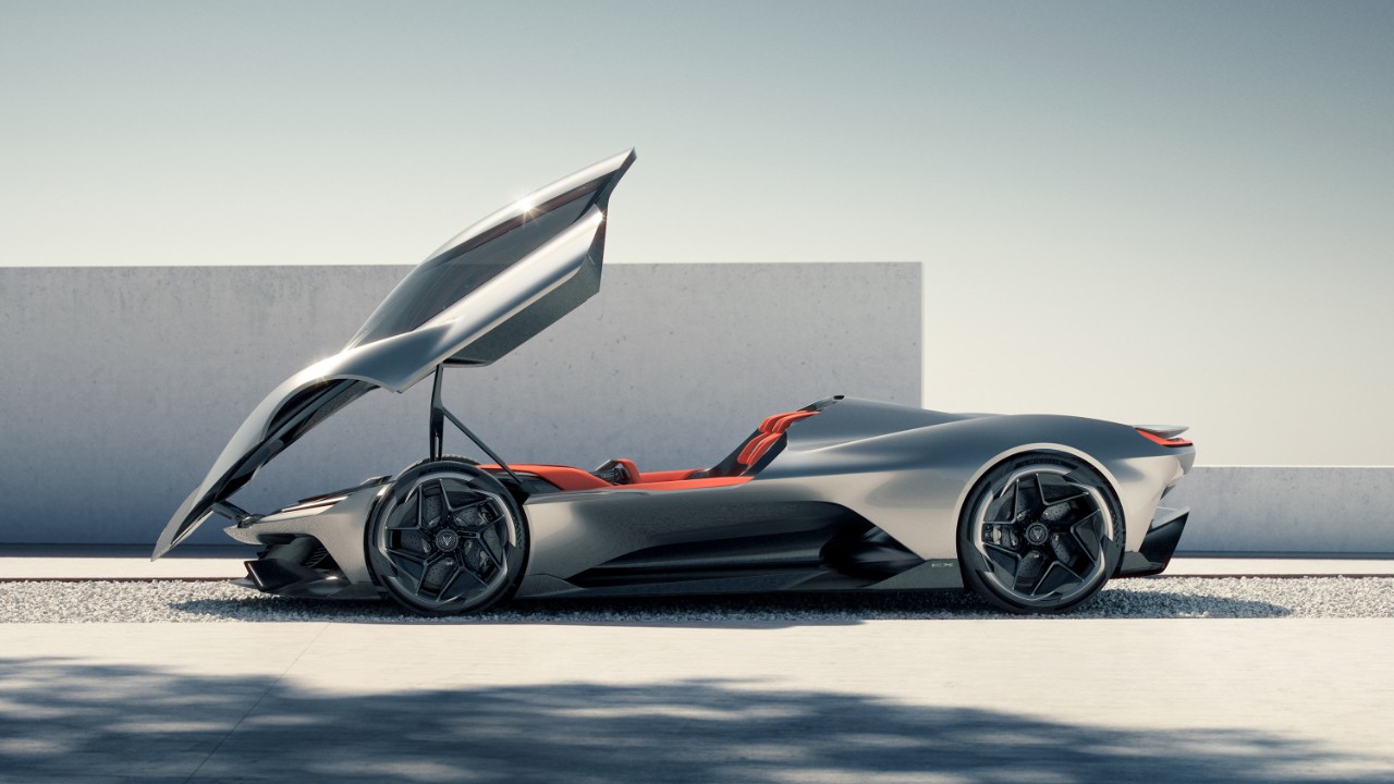 Corvette CX Concept The interior and bucket seats of a silver convertible sports car.